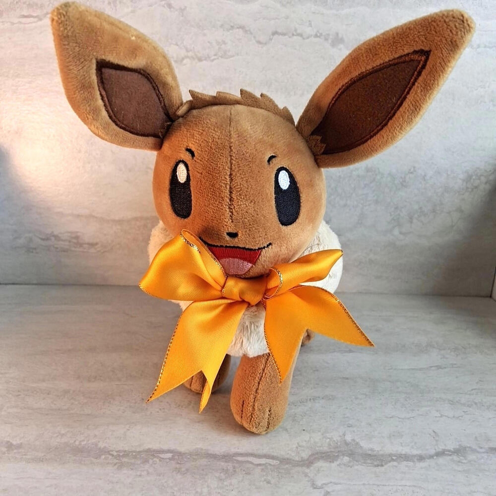 Pokémon Plush Eevee Brown Yellow Bow Winter Holiday Edition 8” 2021 Nintendo Toy